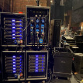 Steve Litscher with amplifier racks backstage